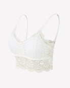 White floral lace bralette crop top with scalloped trim and spaghetti straps.