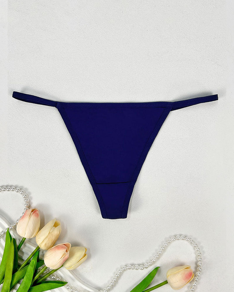 Low-rise thong panties in dark blue with smooth seamless design and soft coverage.