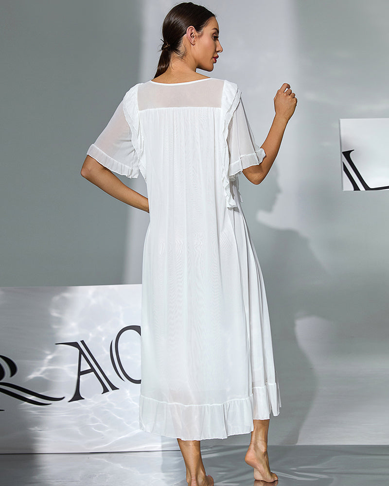 White double-layer mesh nightgown, back view, elbow-length flutter sleeves and ruffled hem