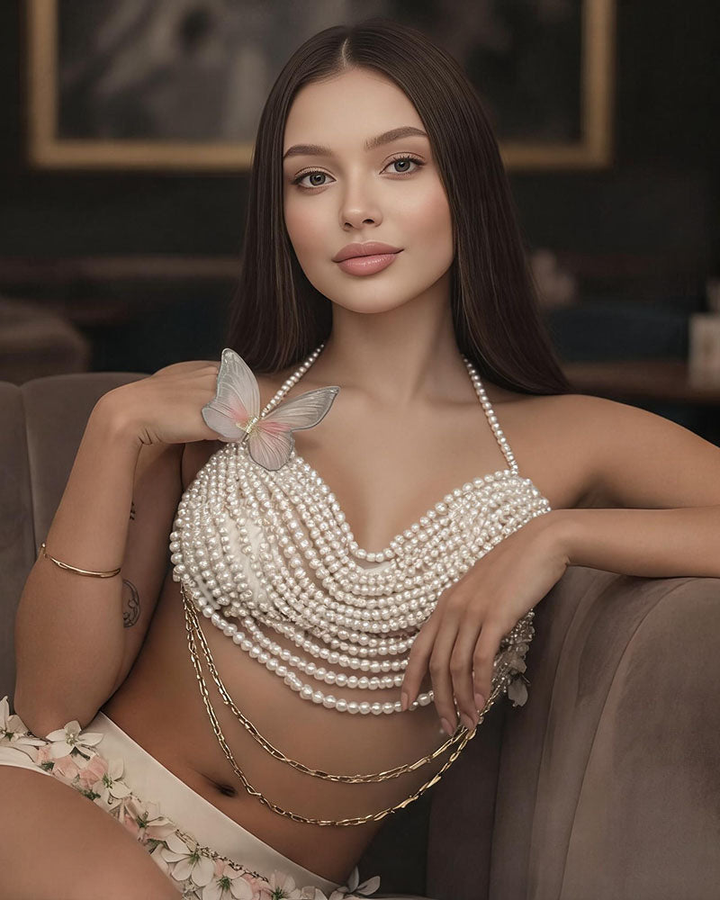 White pearl body jewelry halter top with butterfly detail and draped pearl rows