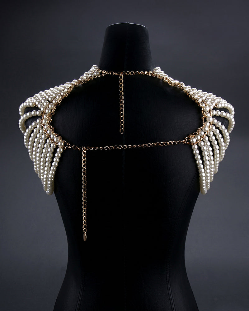 Pearl chain shoulder embellishment with long dangling charms; layered pearl strings