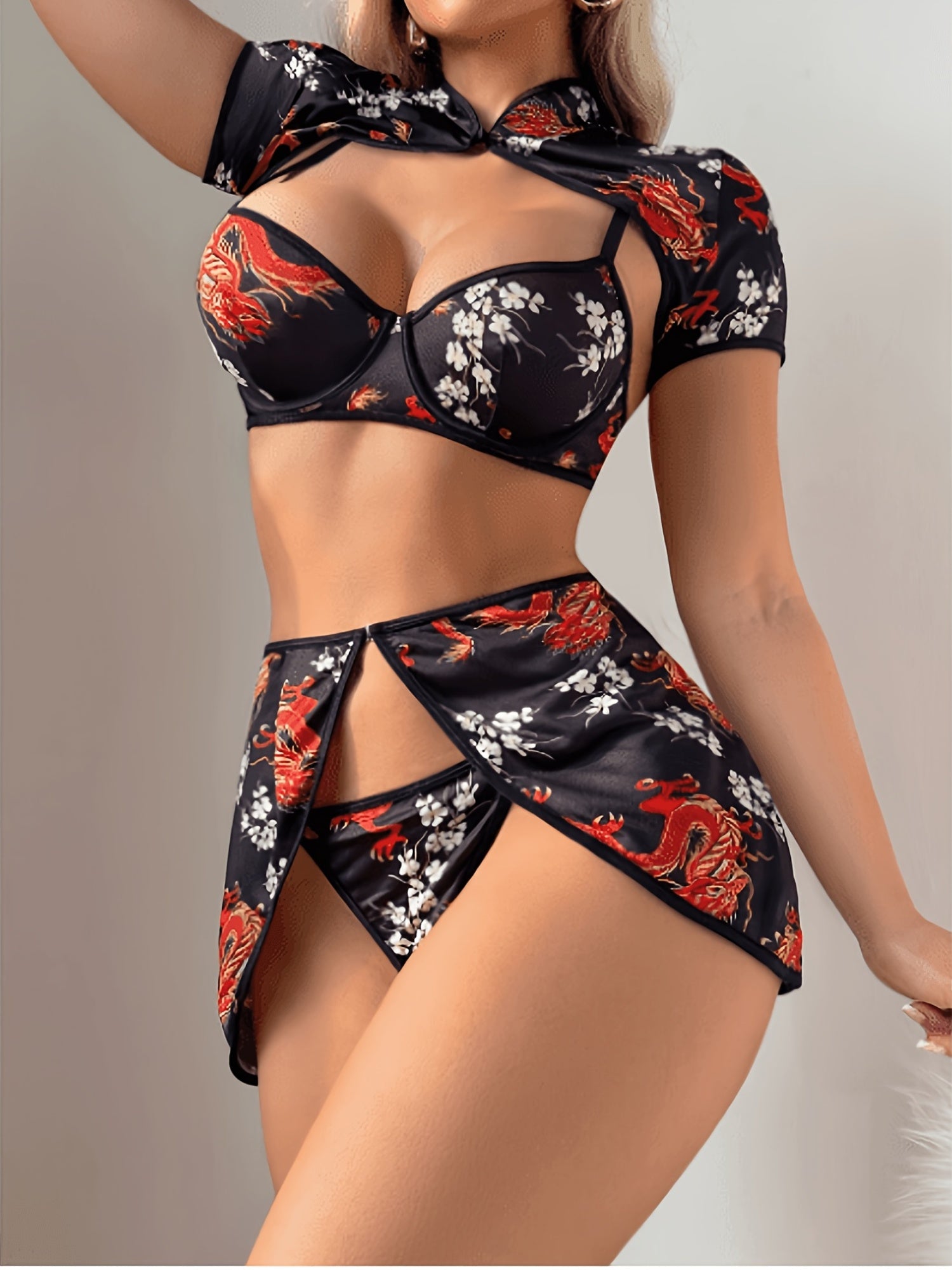 Black satin lingerie set with red dragon and floral print, cutout bra and mini skirt