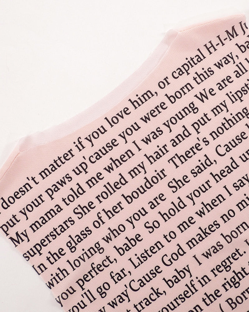 Pink-beige sheer mesh with diagonal black lyric text print detail