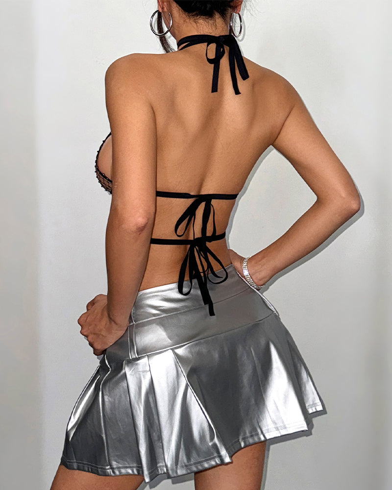 Back view of black strappy lace balconette bra with tie-back straps