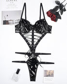 Black patent PVC lace-up corset bodysuit set with underwire cups and garter straps