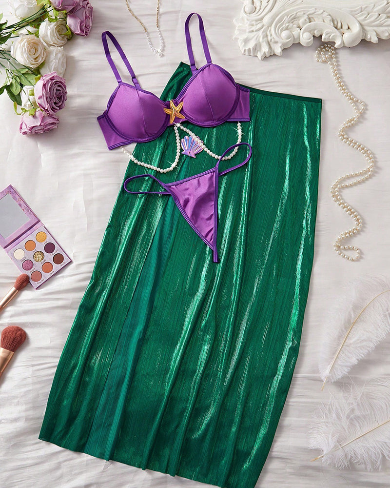 Violet bra, purple thong, and green satin mermaid skirt set with gold starfish and pearl chain