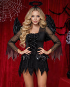 Black corset-style mini dress with sheer sleeves, feather wing accessories, layered hem