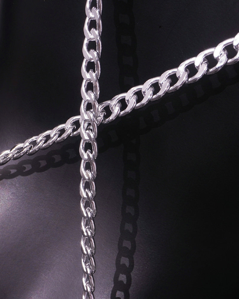 Close-up of shiny silver chain links with looped connectors.