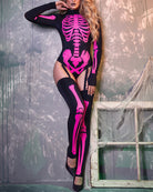 Hot pink skeleton-print bodysuit with gloves and thigh-high stockings, one arm raised