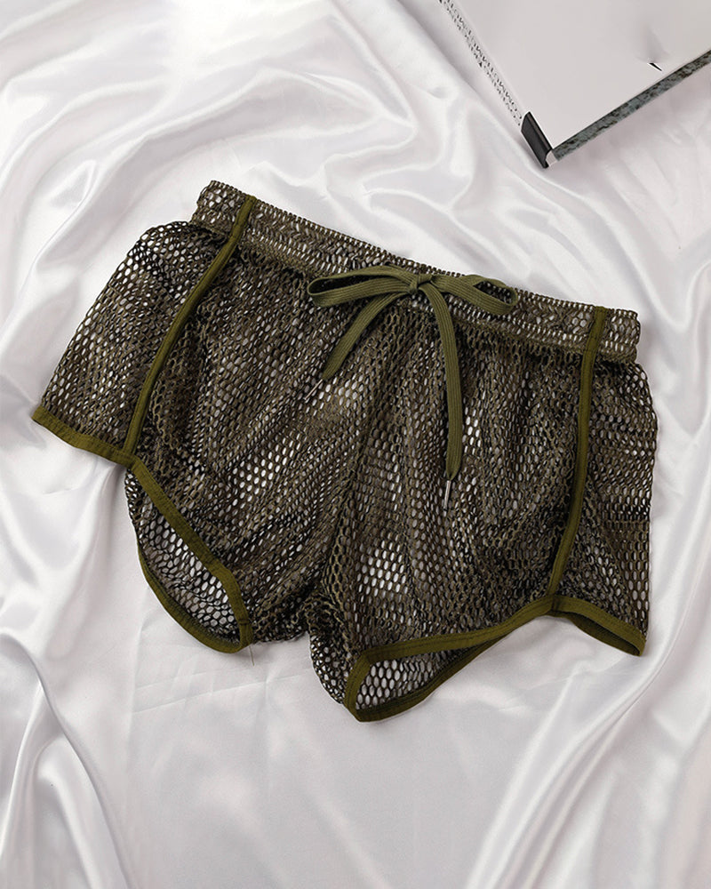 Army green open mesh drawstring shorts with elastic waistband and loose leg.