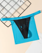 Sheer black mesh G-string thong with blue elastic waistband