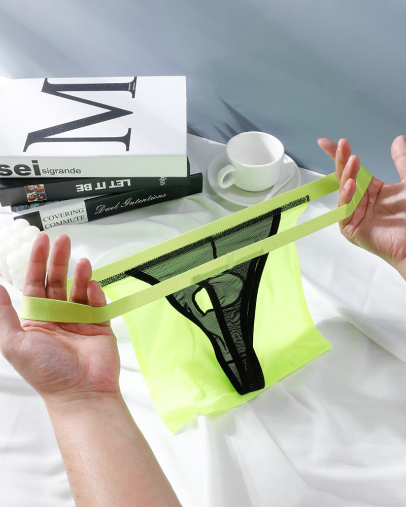 Sheer black G-string thong with neon green elastic waistband