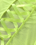 Neon green sheer mesh fabric texture with stitched lattice trim