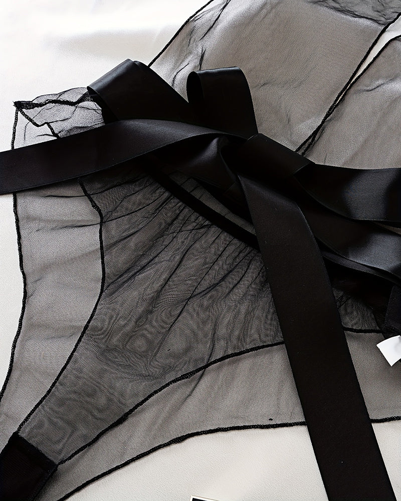 Black sheer mesh bodysuit detail: satin bow and wide ribbon ties