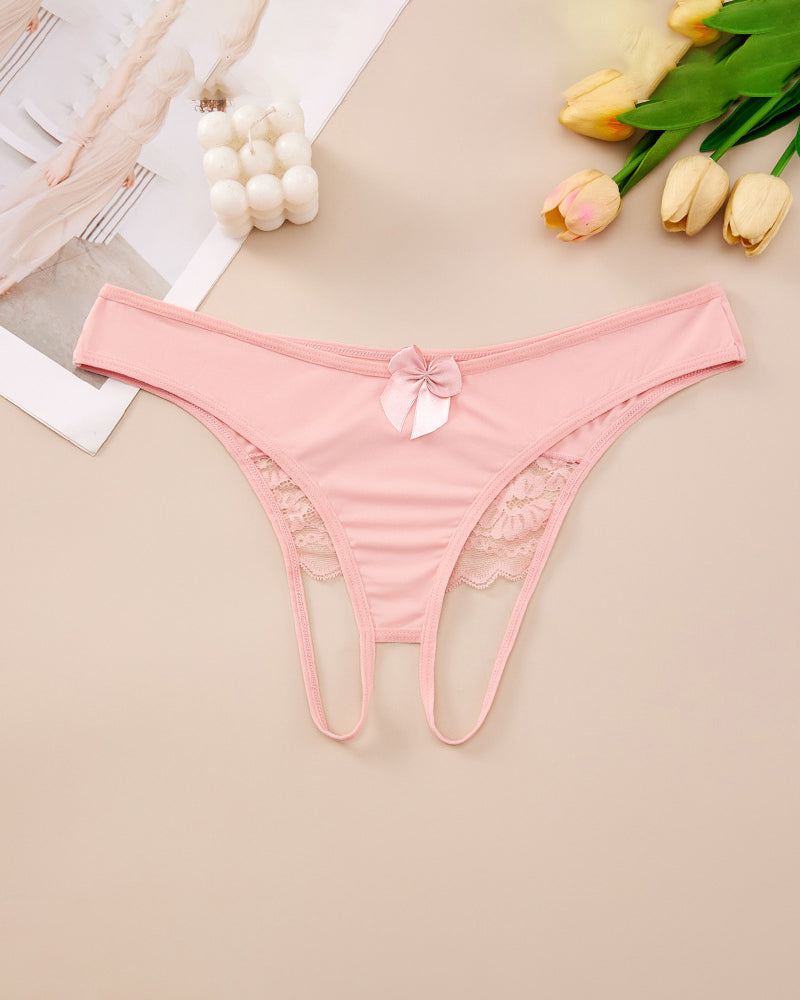 Plus size pink crotchless lace thong with lace-trim waistband and center bow