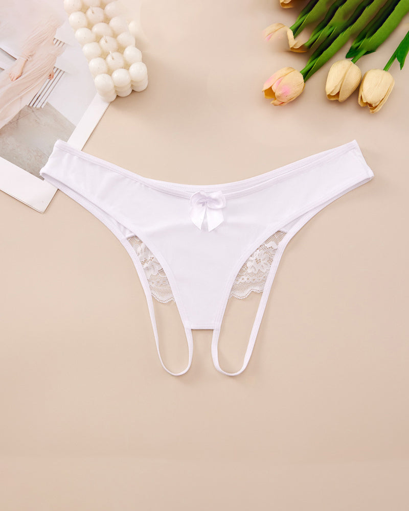 Plus size white crotchless lace thong with lace-trim waistband and center bow