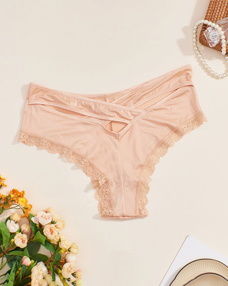 Nude mid-rise criss-cross bikini panties with lace trim