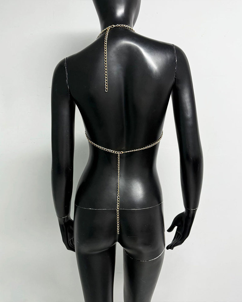Gold metallic chain halter bra top back on mannequin with long center chain