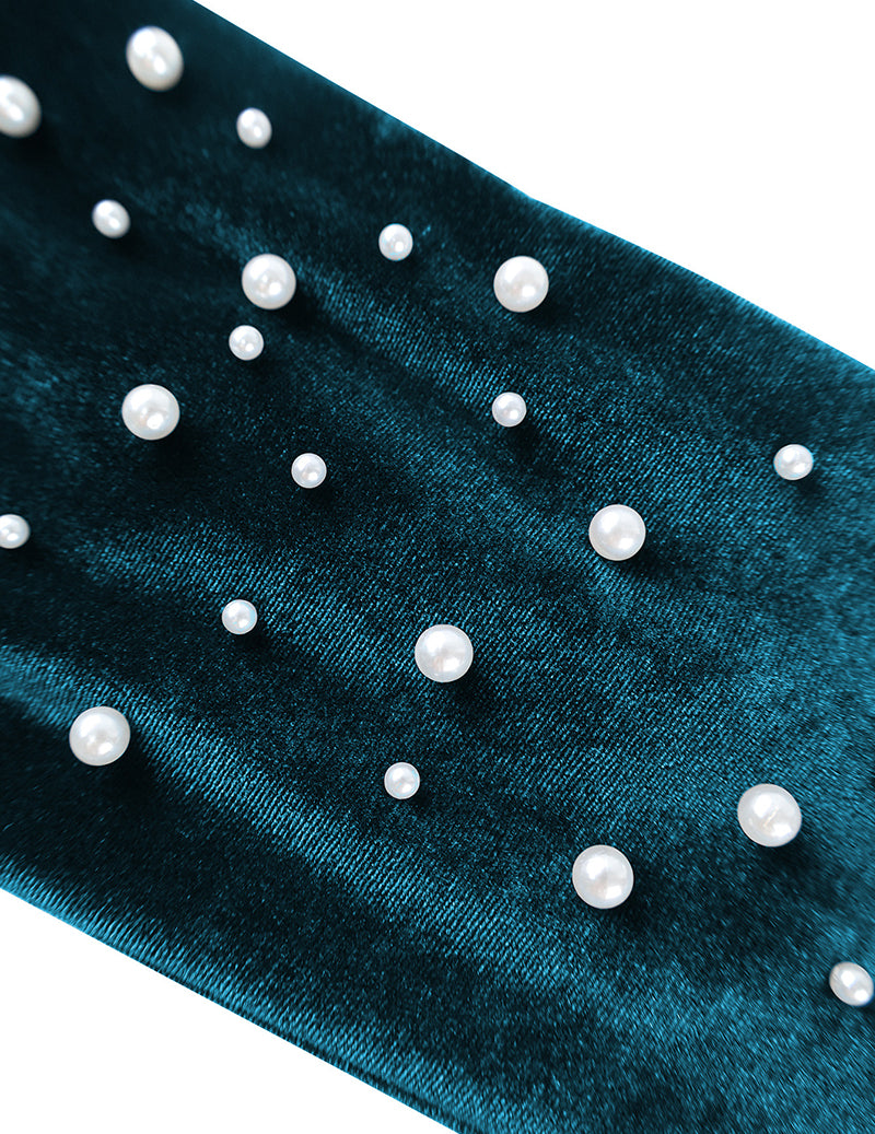 Peacock blue velvet sleeve with pearl-like beads and small rhinestone accents