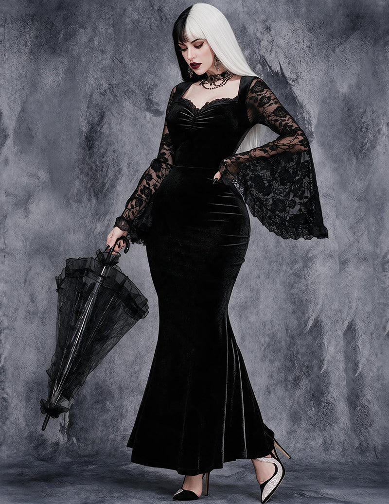 Black velvet mermaid dress with lace bell sleeves, fitted waist, long flared skirt.