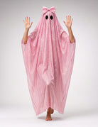 Light pink sequin ghost cape with bow hood and two black eye cutouts, draped poncho