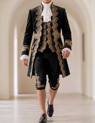 Men’s baroque prince costume set in dark fabric with gold embroidered coat, vest, and knee pants