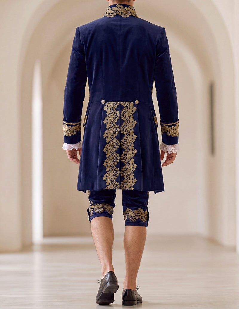 Back view of men’s baroque prince coat in dark blue with gold embroidery and knee pants