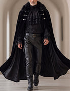 Gothic 3-piece set with black ruffled shirt, leather-look pants, and fur-trim cape