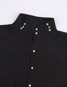 Black shirt collar with silver-tone buttons and stand neckline