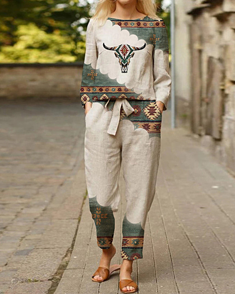 Beige linen two-piece tracksuit with bull skull print. Casual style for leisure and daily wear.